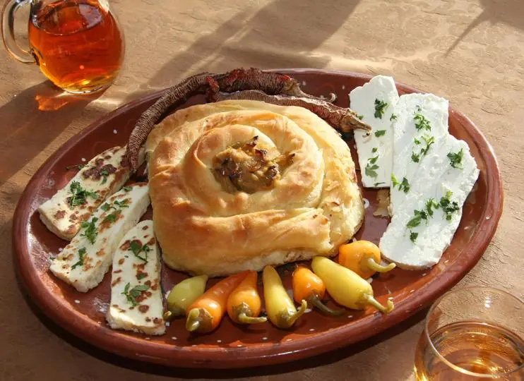 Macedonian dishes: burek, grilled peppers and white cheese